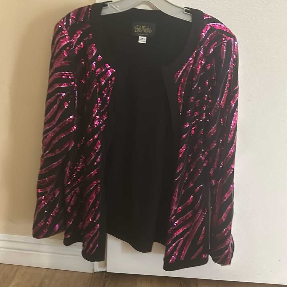Bob Mackie sweater.